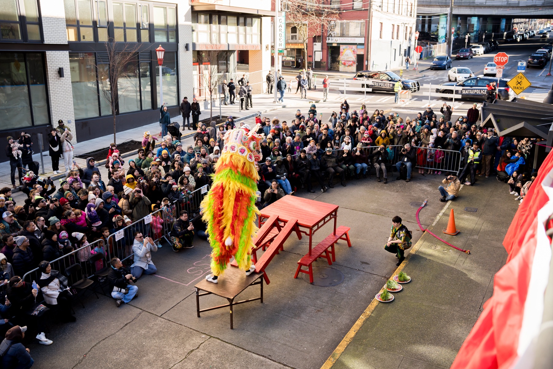 A crowd gathered in the Chinatown-International District to watch a Mak Fai lion dance performance